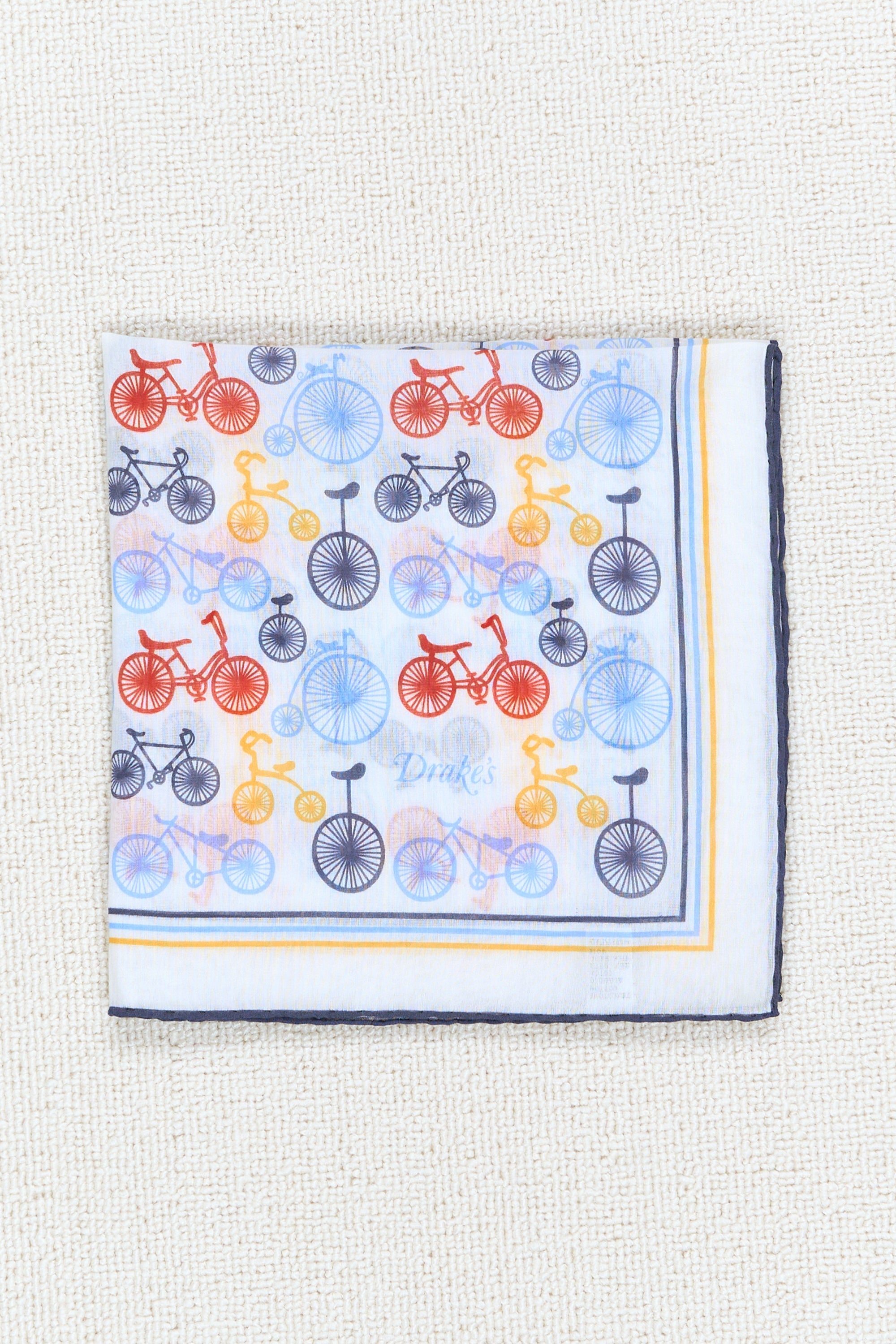 Drake's White with Red/Blue/Yellow Bike Pattern Cotton/Silk Pocket Square