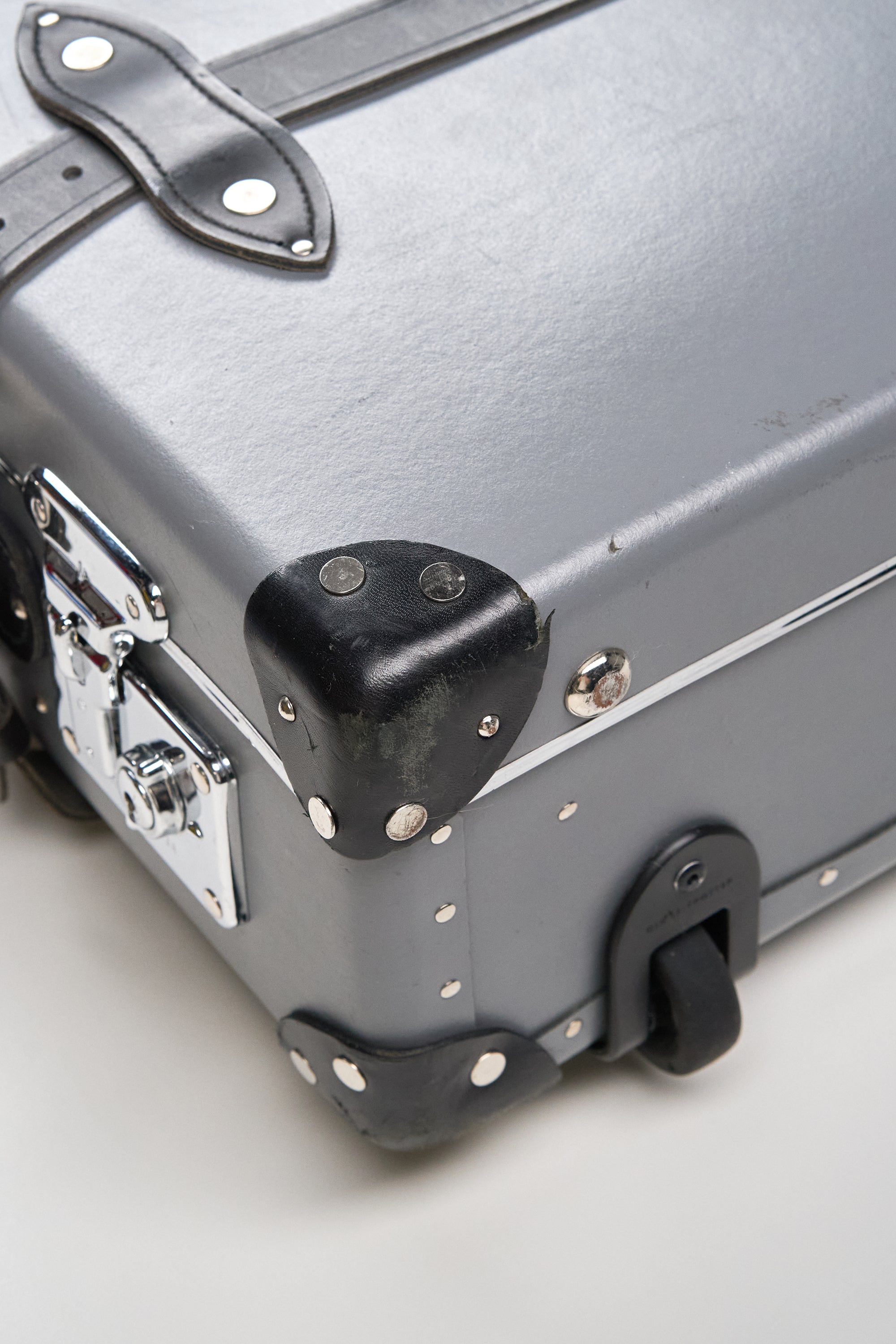 Globe Trotter Grey with Black Luggage
