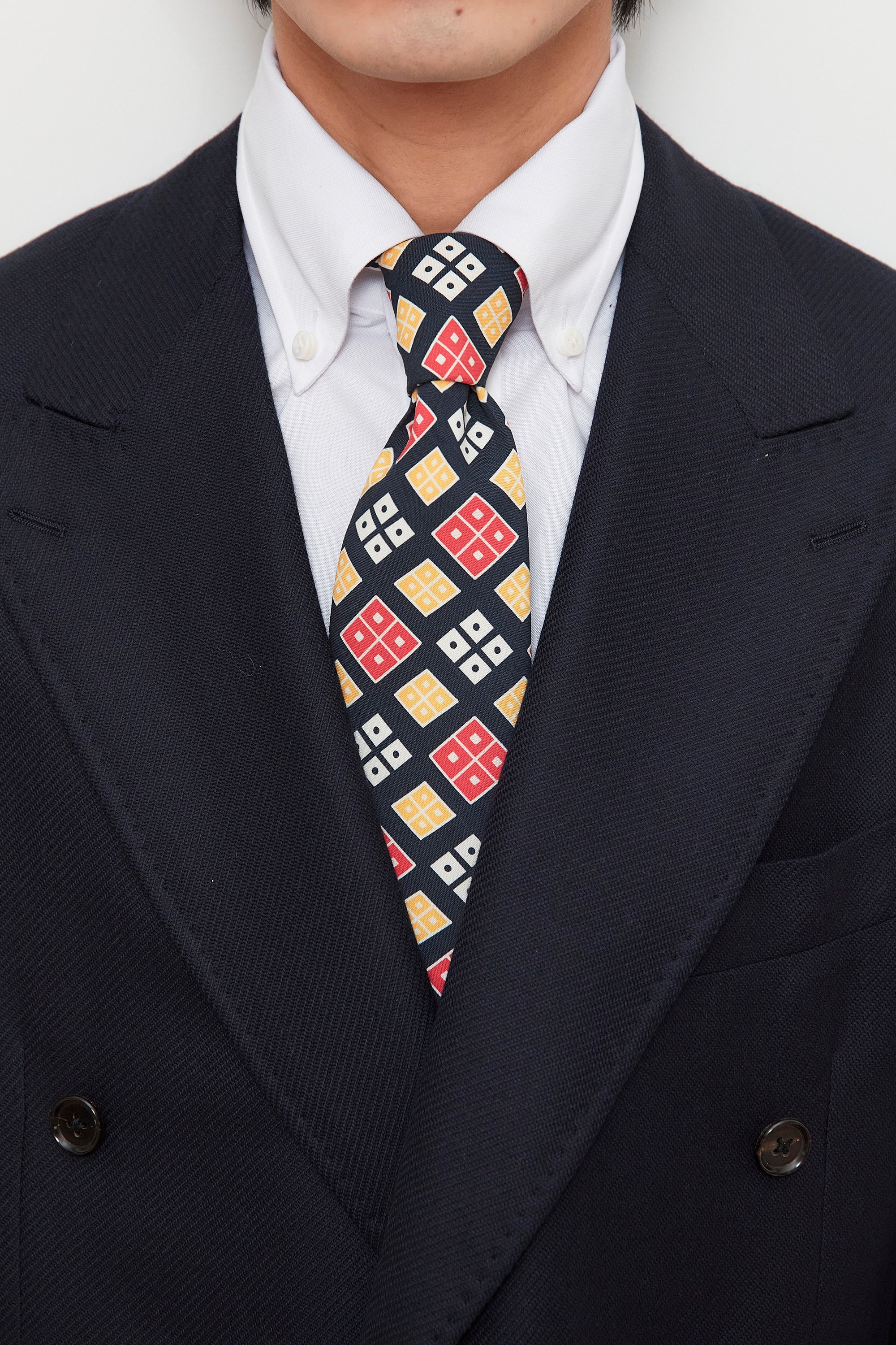 Drake's Navy with Red/Yellow/White Rhombus Pattern Silk Tie